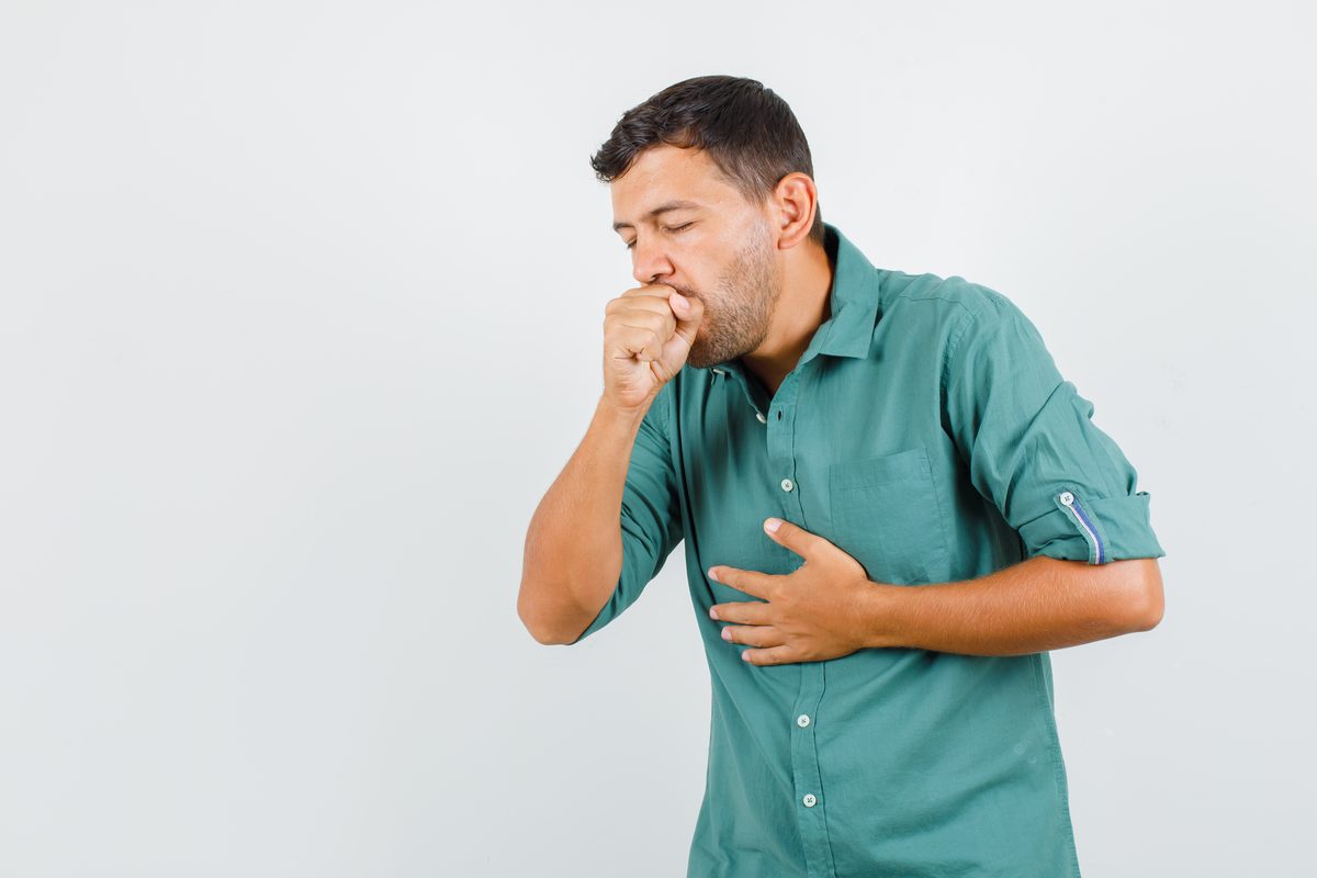 Young man suffering from persistent cough — acupuncture for cough relief in Boca Raton, Florida