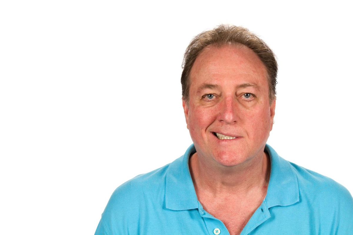 Man showing one-sided facial weakness characteristic of Bell's palsy — acupuncture for Bell's palsy facial paralysis in Boca Raton by Ronen Rosenblatt Nir