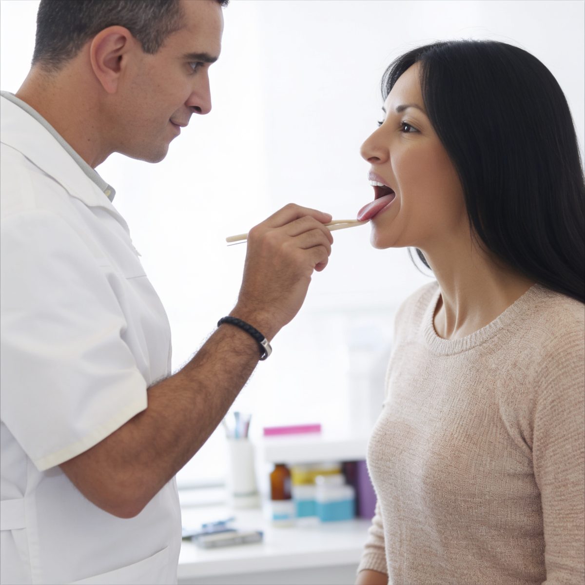 Tongue diagnosis examination showing TCM diagnostic technique - Traditional Chinese medicine patient assessment